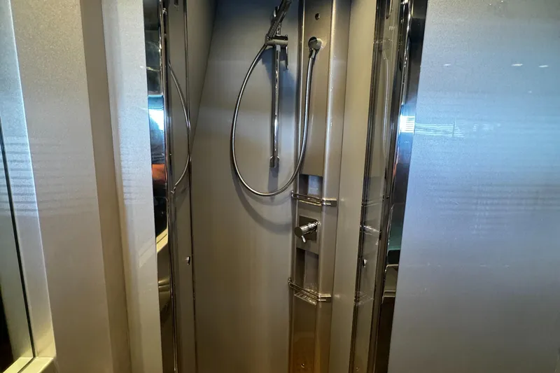 Sea Sea Yacht Photos Pics Shower area inside a 2013 Riva Rivarama Super yacht, featuring sleek chrome fixtures.