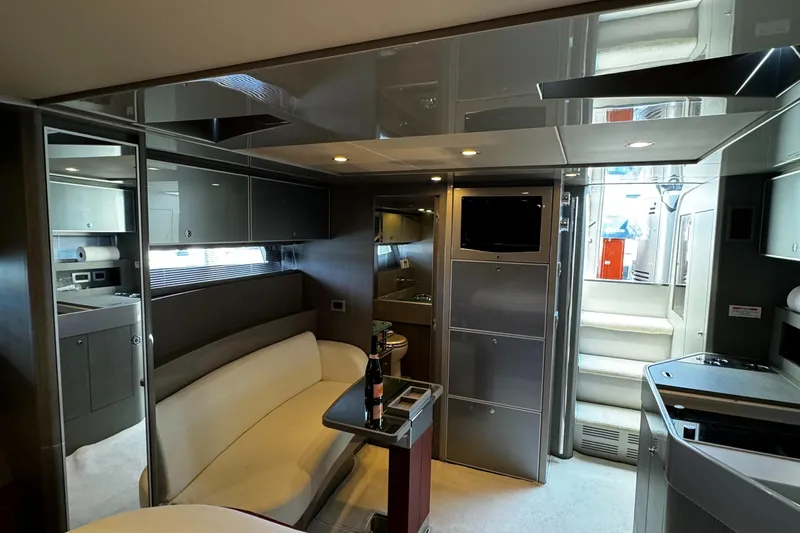 Sea Sea Yacht Photos Pics Luxurious interior of a 2013 Riva Rivarama Super yacht with modern furnishings and sleek design.