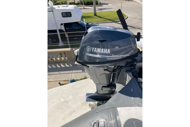 Lamb Chop Yacht Photos Pics Yamaha four-stroke outboard motor on a 1985 Bertram 58 Flybridge Motor Yacht.