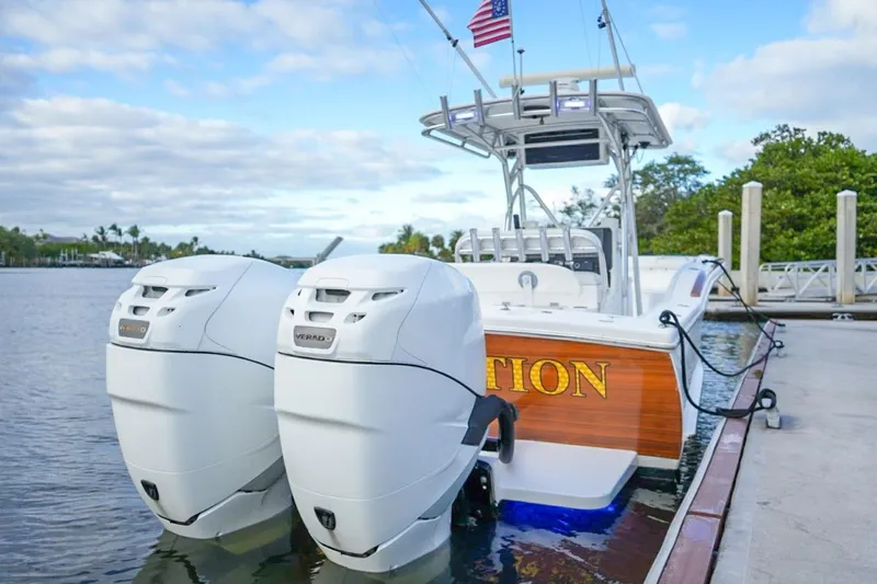  Yacht Photos Pics 2008 Buddy Davis 28 Center Console boat docked with dual outboard engines.