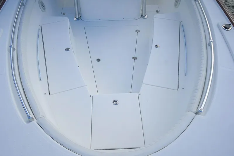  Yacht Photos Pics 2008 Buddy Davis 28 Center Console boat deck with storage compartments.