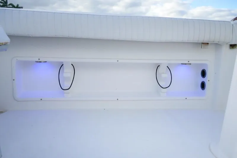  Yacht Photos Pics 2008 Buddy Davis 28 Center Console boat storage compartment with blue LED lighting.