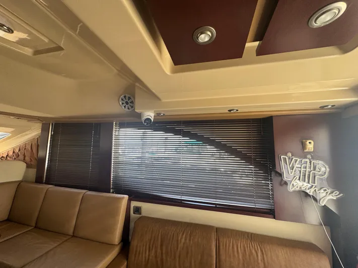  Yacht Photos Pics Luxurious interior of 2007 Sea Ray 360 Sedan with leather seating and VIP lounge sign.