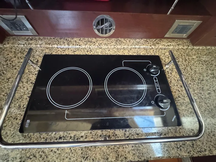  Yacht Photos Pics Stovetop on 2007 Sea Ray 360 Sedan yacht, featuring two burners and sleek design.