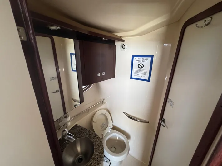  Yacht Photos Pics Bathroom interior of 2007 Sea Ray 360 Sedan with marine toilet and sink.