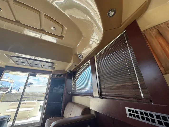  Yacht Photos Pics Interior of 2007 Sea Ray 360 Sedan with modern design and wooden blinds.