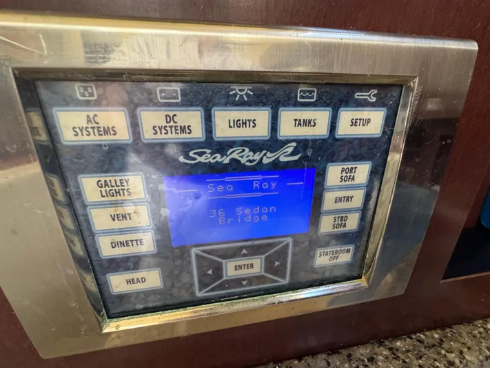  Yacht Photos Pics Control panel of a 2007 Sea Ray 360 Sedan yacht with various system buttons.