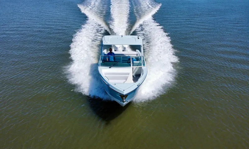  Yacht Photos Pics 2021 Aviara AV32 OB boat cruising on open water.