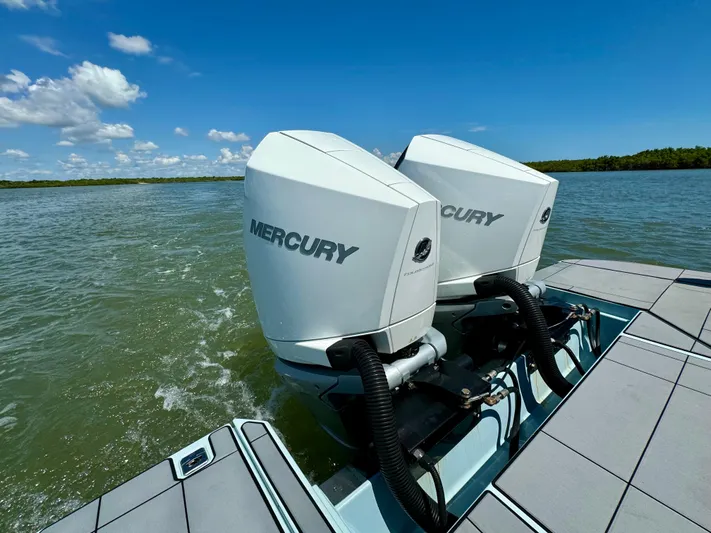  Yacht Photos Pics 2021 Aviara AV32 OB with twin Mercury outboard engines on the water.