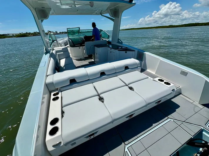  Yacht Photos Pics 2021 Aviara AV32 OB luxury boat with spacious seating and modern design on a sunny day.