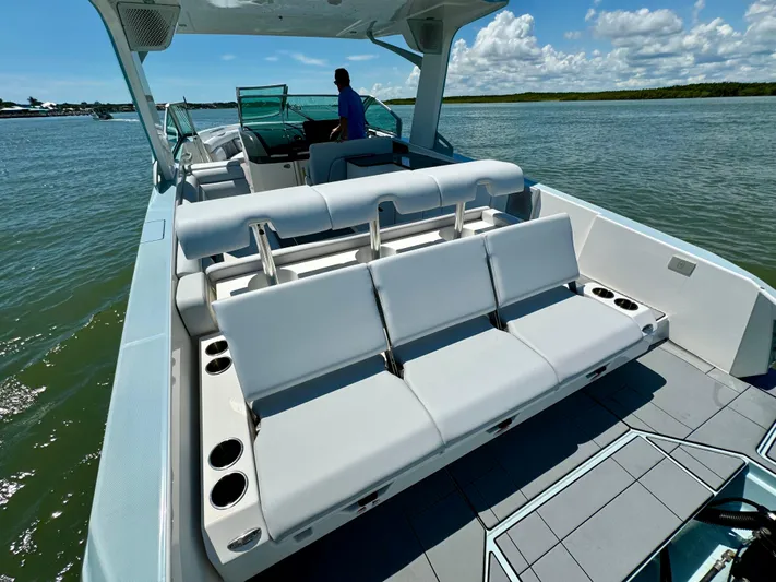  Yacht Photos Pics 2021 Aviara AV32 OB luxury boat with spacious seating on a sunny day.