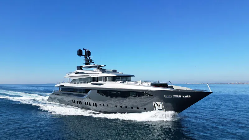 Provocateur Yacht Photos Pics Luxurious 2016 Mondomarine 50 Meters yacht cruising on open sea under clear blue sky.