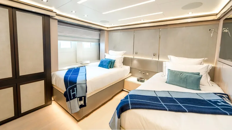 Provocateur Yacht Photos Pics Luxurious Mondomarine 50 Meters 2016 yacht bedroom with twin beds and elegant decor.