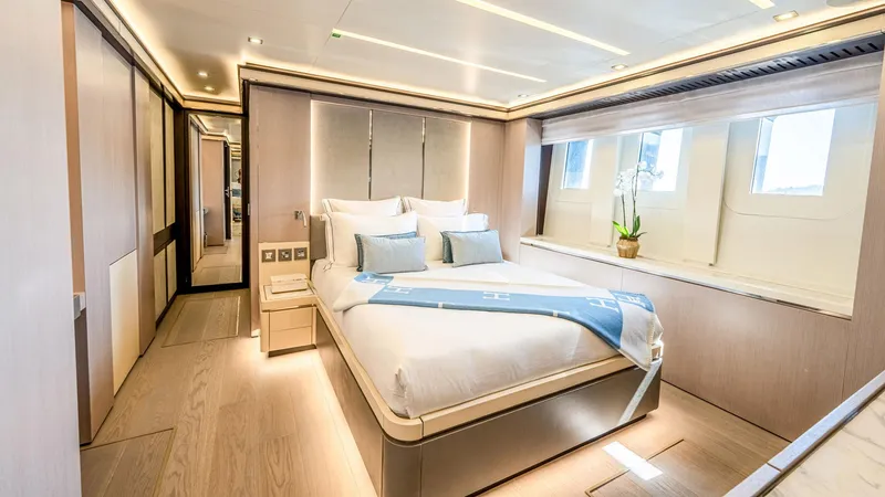 Provocateur Yacht Photos Pics Luxurious bedroom interior on 2016 Mondomarine 50 Meters yacht, featuring elegant design and natural light.