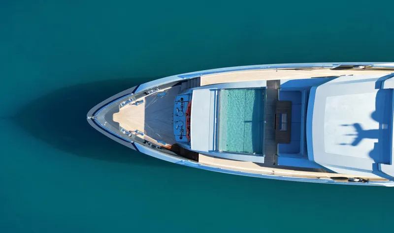 Provocateur Yacht Photos Pics Aerial view of 2016 Mondomarine 50 Meters yacht on clear blue water.