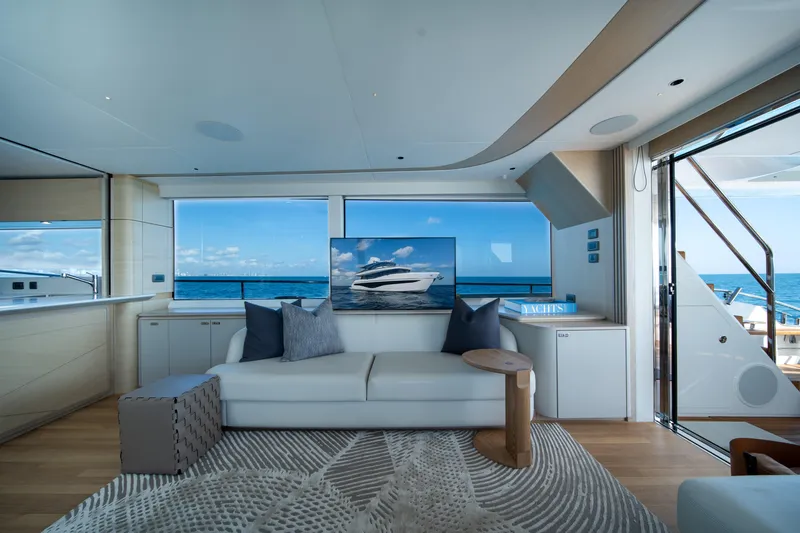 Maravi Yacht Photos Pics Luxurious interior of 2025 Princess X80 yacht with ocean view and modern decor.