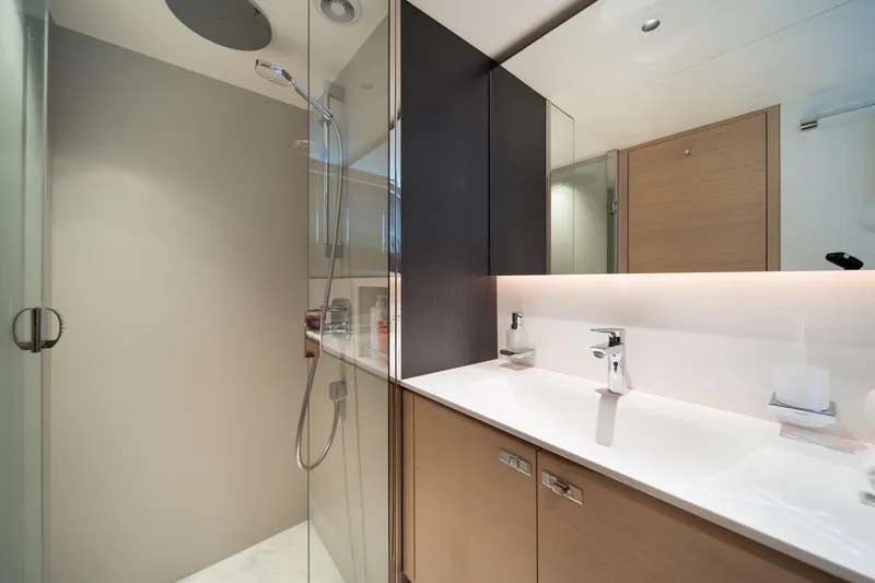 Maravi Yacht Photos Pics Modern bathroom interior on 2025 Princess X80 yacht, featuring sleek design and luxury fixtures.