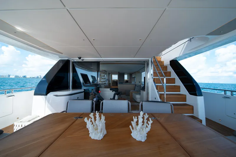 Maravi Yacht Photos Pics Luxurious 2025 Princess X80 yacht interior with elegant dining area and ocean view.