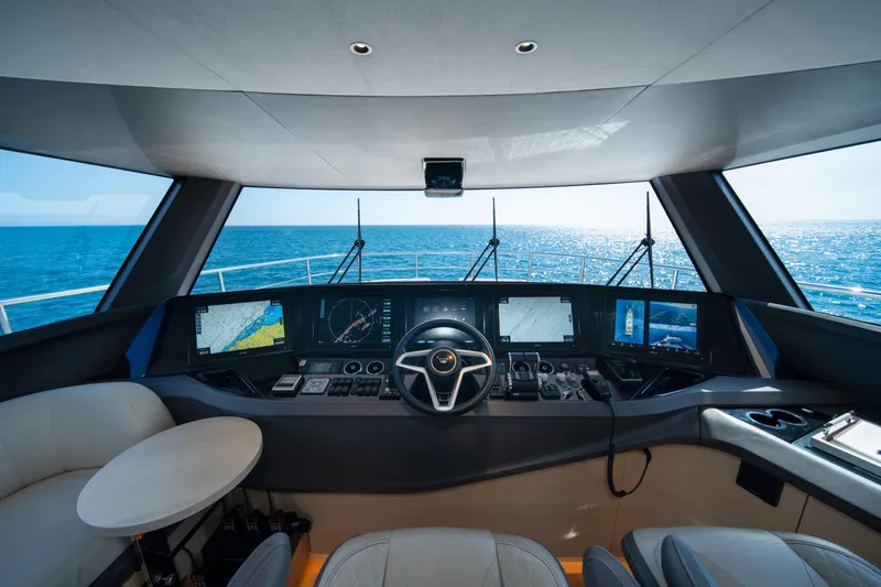 Maravi Yacht Photos Pics Cockpit of 2025 Princess X80 yacht with advanced navigation systems and ocean view.