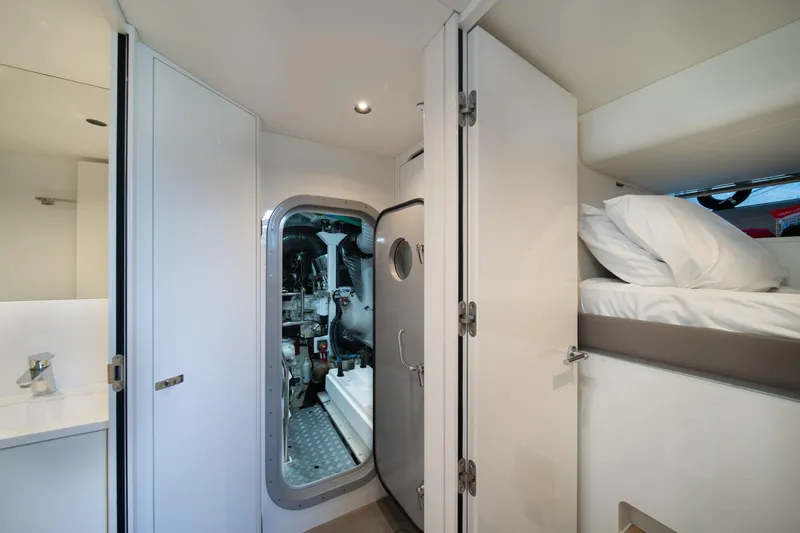 Maravi Yacht Photos Pics Engine room access in 2025 Princess X80 yacht, featuring modern interior and bunk bed.