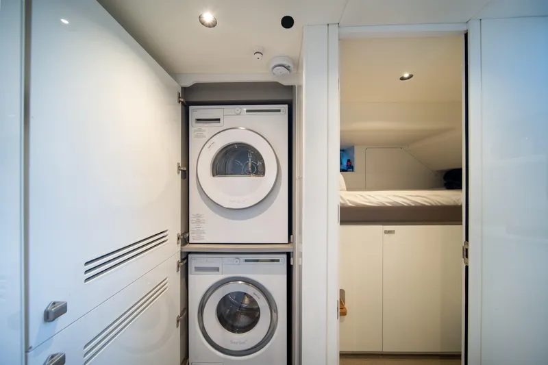 Maravi Yacht Photos Pics Laundry area and compact bedroom in 2025 Princess X80 yacht.