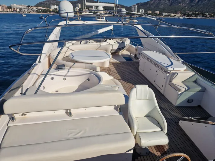  Yacht Photos Pics Luxurious 2000 Astondoa 82 GLX yacht deck with seating and ocean view.