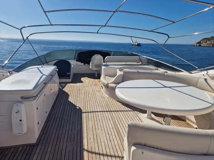  Yacht Photos Pics Luxurious 2000 Astondoa 82 GLX yacht deck with seating and ocean view.