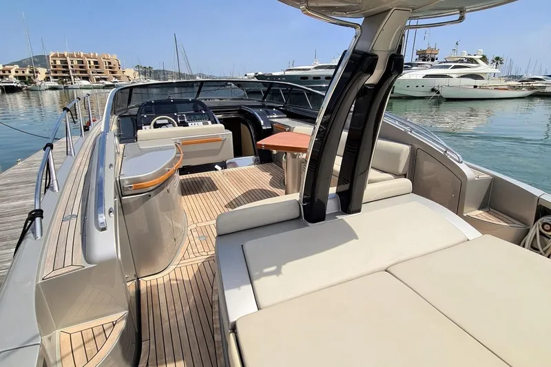 Infinity Yacht Photos Pics Luxurious 2008 Riva 52 LE yacht with elegant deck and modern interior at marina.