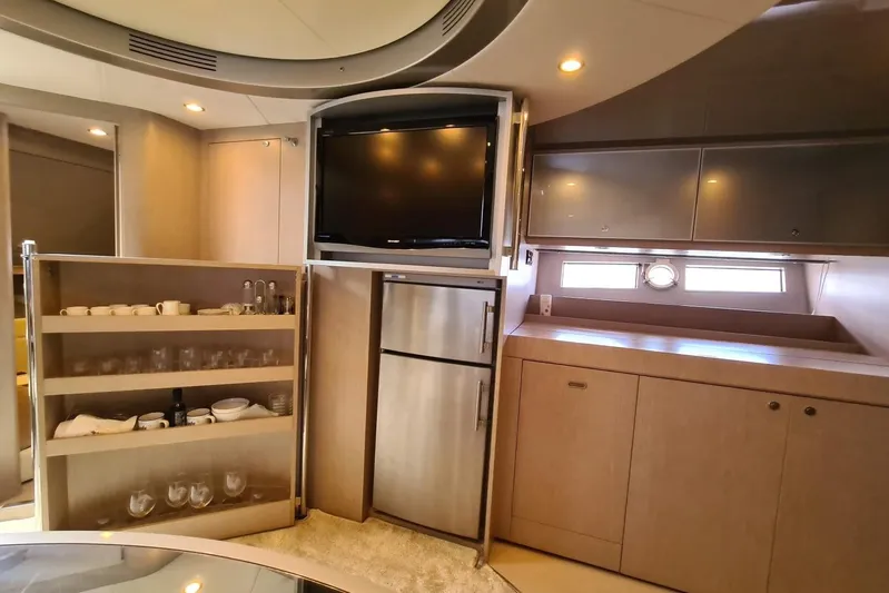 Infinity Yacht Photos Pics Luxurious interior of a 2008 Riva 52 LE yacht with modern amenities.