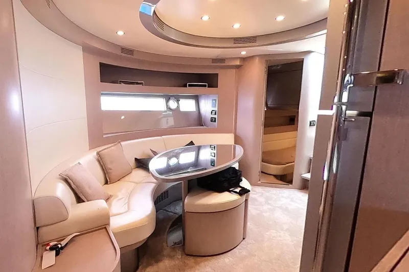 Infinity Yacht Photos Pics Luxurious interior of a 2008 Riva 52 LE yacht with elegant seating and modern design.