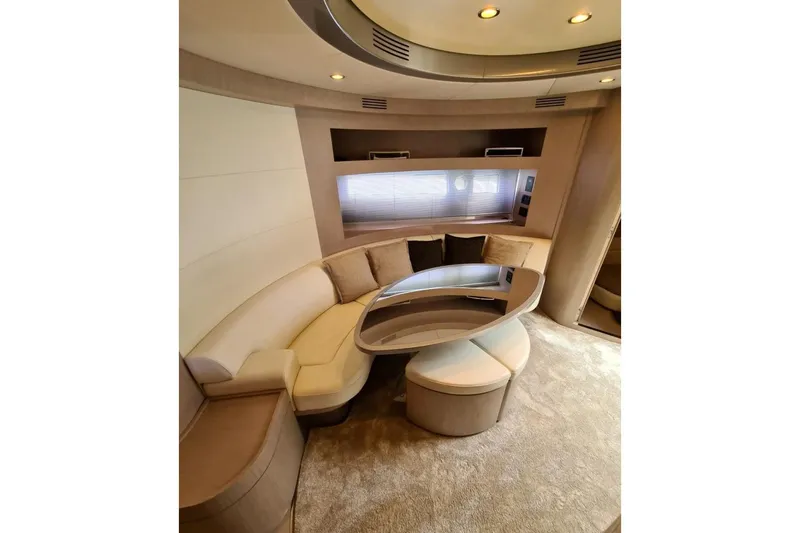Infinity Yacht Photos Pics Luxurious interior of a 2008 Riva 52 LE yacht with elegant seating and modern design.