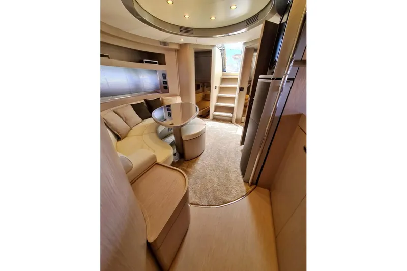Infinity Yacht Photos Pics Luxurious interior of a 2008 Riva 52 LE yacht with elegant seating and modern design.