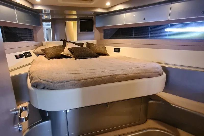 Infinity Yacht Photos Pics Luxurious cabin interior of 2008 Riva 52 LE yacht with cozy bed and modern design.