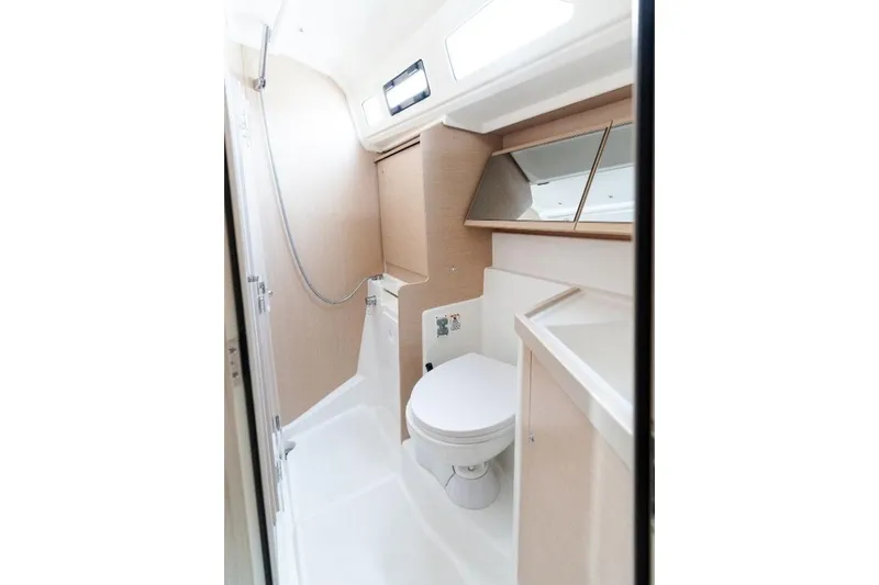  Yacht Photos Pics 2021 Beneteau Oceanis 40.1 yacht bathroom with modern fixtures and sleek design.