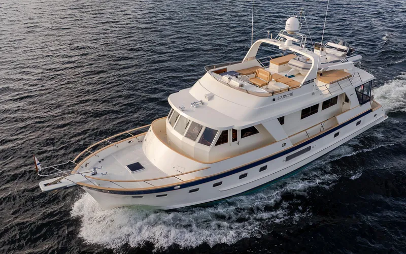 L'apache Yacht Photos Pics Luxury 2006 Alaskan 65 Flushdeck yacht cruising on open water.
