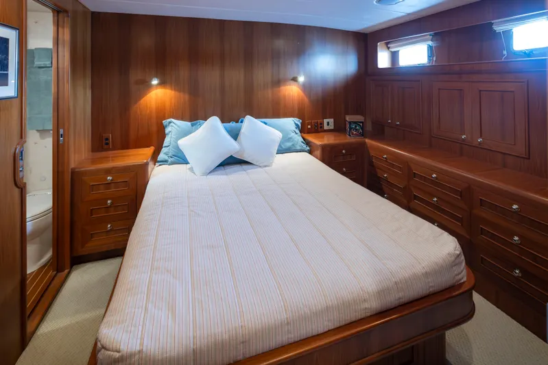 L'apache Yacht Photos Pics Luxurious wooden cabin interior of 2006 Alaskan 65 Flushdeck yacht.