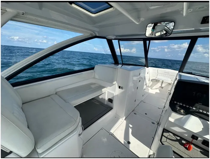  Yacht Photos Pics Interior of 2019 Everglades 340 DC boat with ocean view through windows.