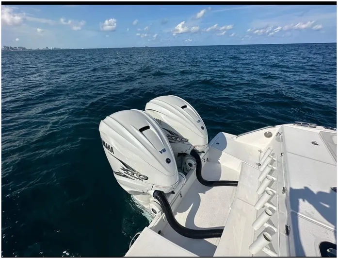  Yacht Photos Pics 2019 Everglades 340 DC boat with twin Yamaha V8 engines on open sea.