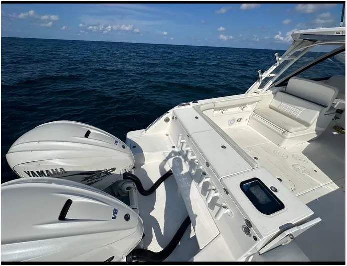  Yacht Photos Pics 2019 Everglades 340 DC boat with Yamaha engines on open sea.