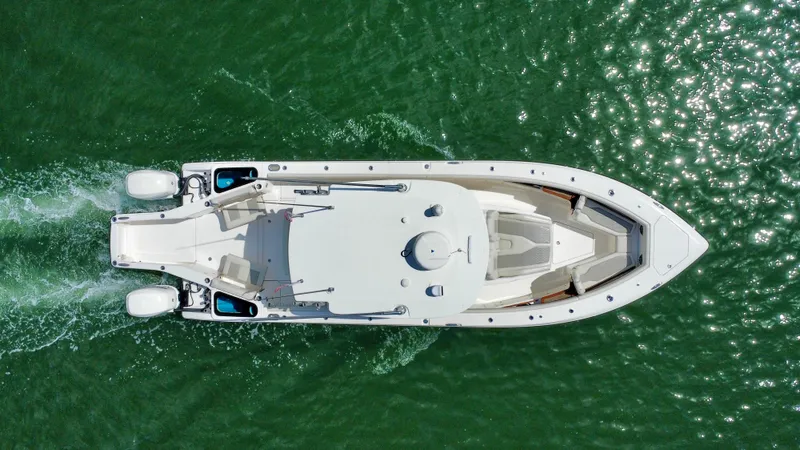 Mermaiden Yacht Photos Pics Aerial view of 2020 Solace 345 boat cruising on green water.