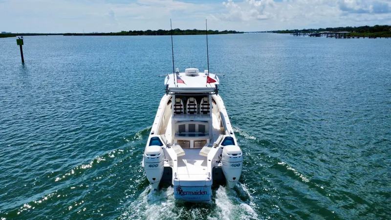 Mermaiden Yacht Photos Pics 2020 Solace 345 boat cruising on open water, rear view.