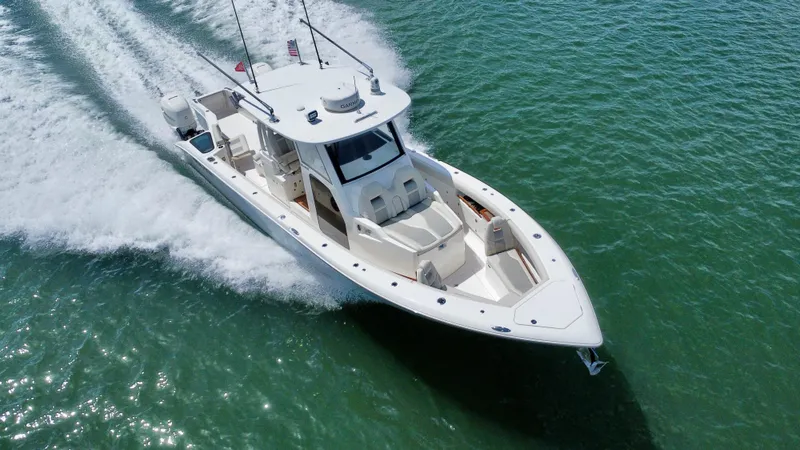 Mermaiden Yacht Photos Pics 2020 Solace 345 boat cruising on clear green water.