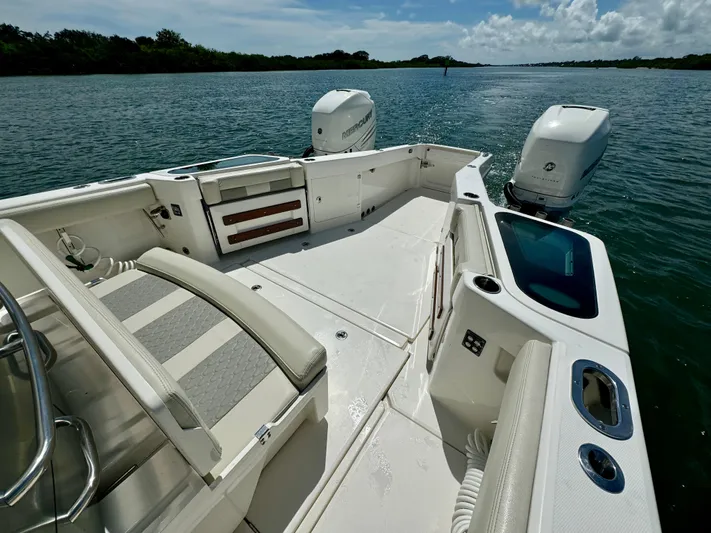 Mermaiden Yacht Photos Pics 2020 Solace 345 boat interior with dual engines on a sunny day.