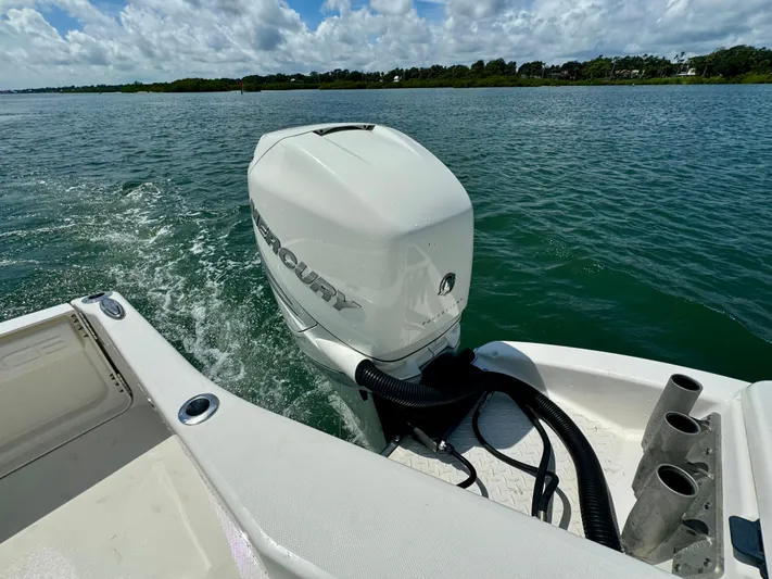 Mermaiden Yacht Photos Pics Solace 345 boat with Mercury outboard engine on a sunny day.