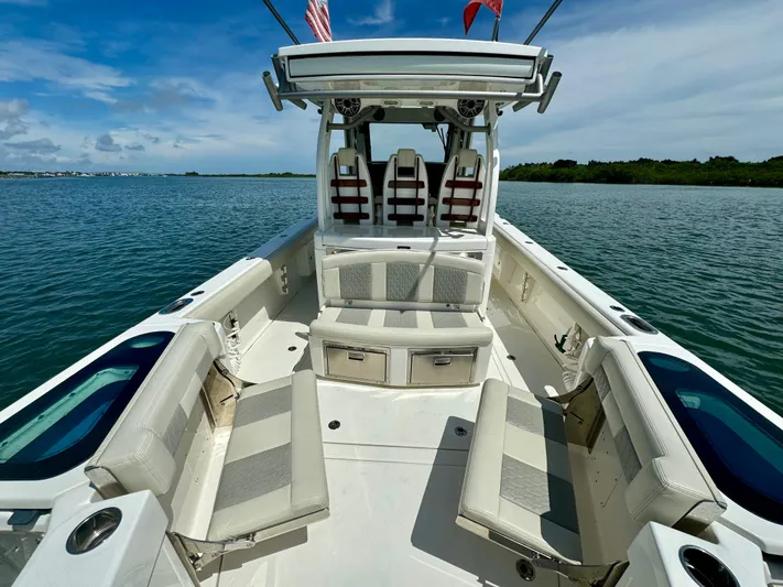 Mermaiden Yacht Photos Pics Solace 345 boat interior, 2020 model, featuring spacious seating and sleek design on calm waters.
