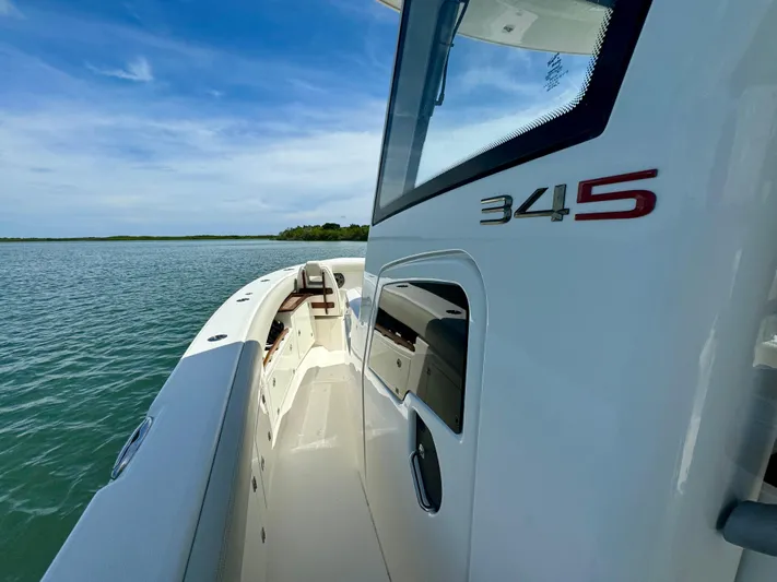 Mermaiden Yacht Photos Pics Solace 345 boat on water, showcasing sleek design and modern features, 2020 model.