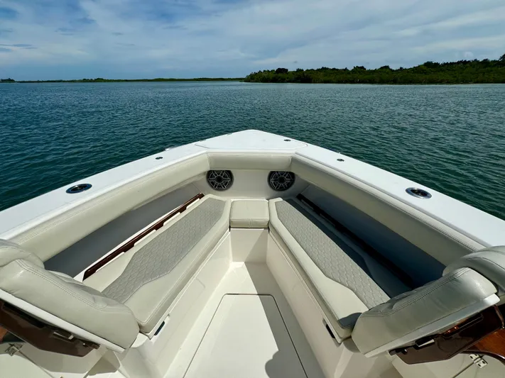 Mermaiden Yacht Photos Pics Solace 345 boat interior, 2020 model, with cushioned seating and scenic water view.