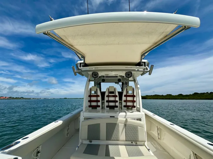 Mermaiden Yacht Photos Pics Solace 345 boat interior, 2020 model, with seating and canopy on a sunny day.