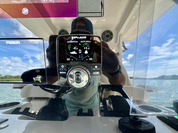 Mermaiden Yacht Photos Pics Solace 345 boat dashboard with digital controls and scenic water view, 2020 model.