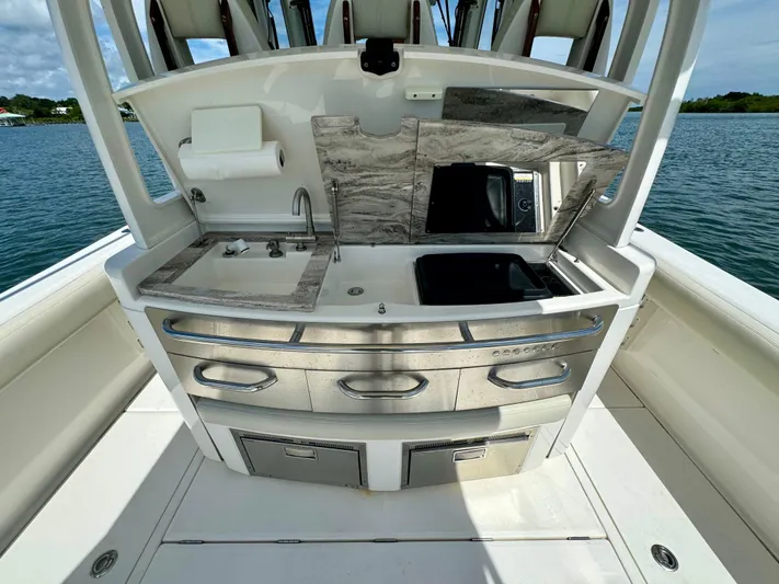 Mermaiden Yacht Photos Pics Solace 345 boat kitchen area with sink, storage, and appliances, 2020 model.